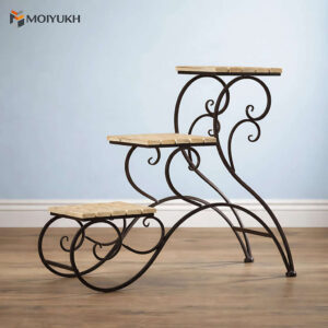 Decorative scroll design metal plant stand with wooden top for indoor plant display in Bangladesh